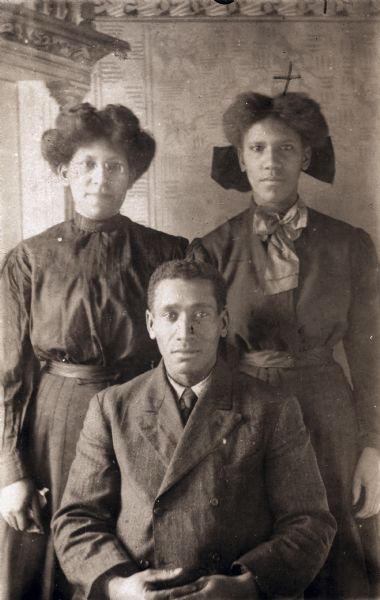 Portrait of William, Sarah (probably Amelia), and Ollie Greene, three children of Thomas and Harriet Greene. The Greenes were settlers in the Pleasant Ridge farming community, and Thomas sat on the school board there.