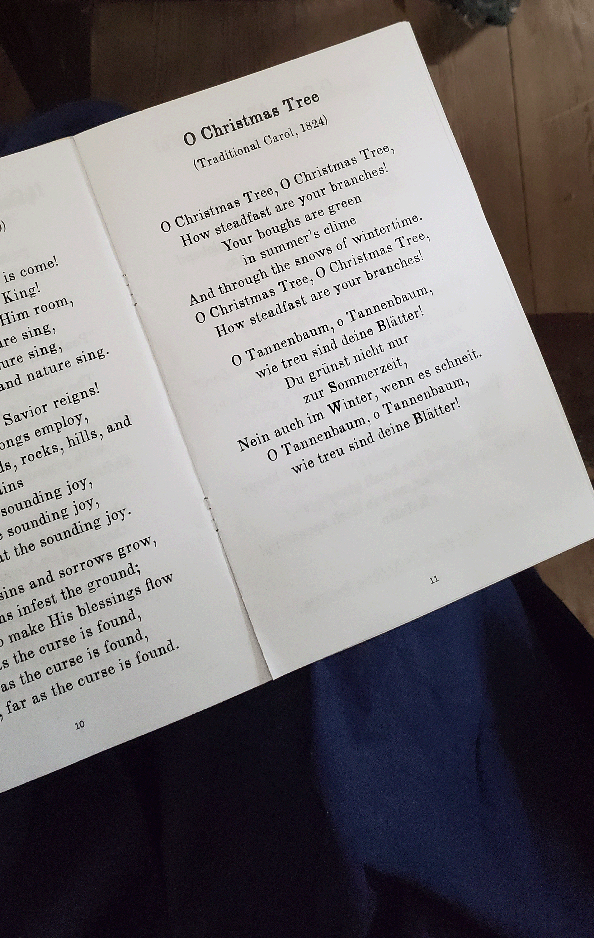 A Christmas music program showing the lyrics to "O Christmas Tree"